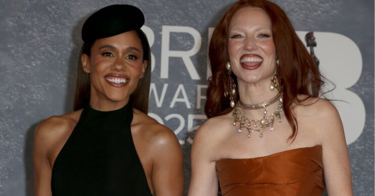 Alex Scott and Jess Glynne holding hands