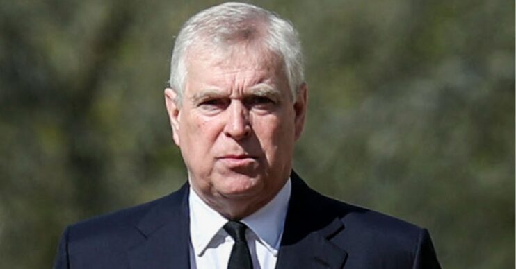 Andrew Mountbatten-Windsor looking serious in suit