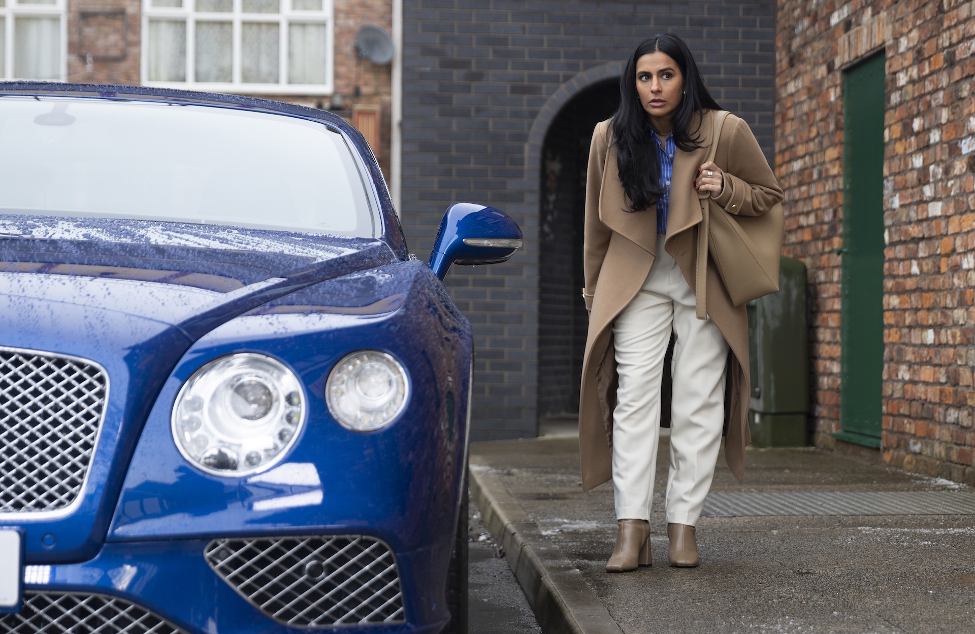 Alya by car in Coronation Street