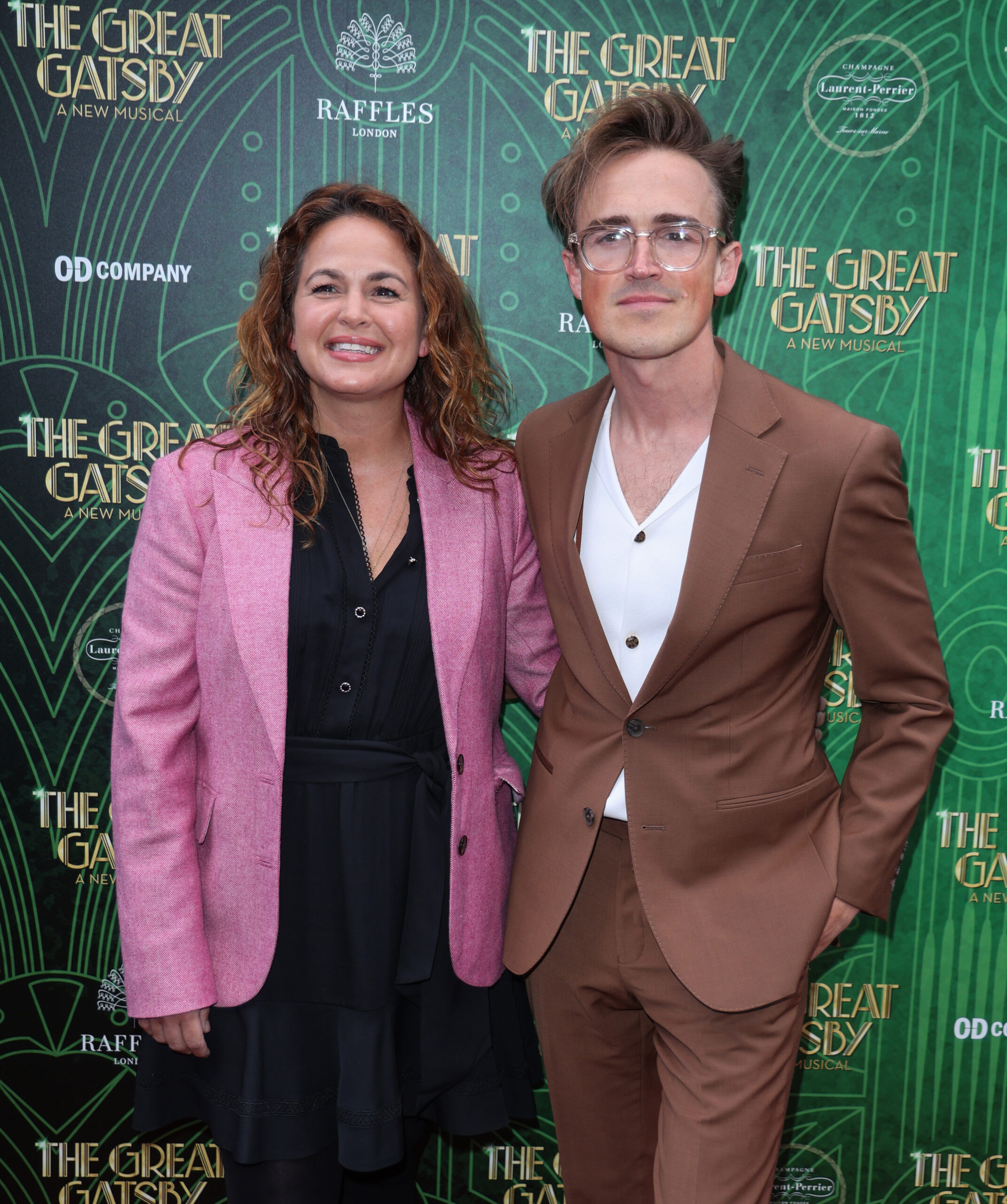 Giovanna Fletcher and Tom at an event together smiling