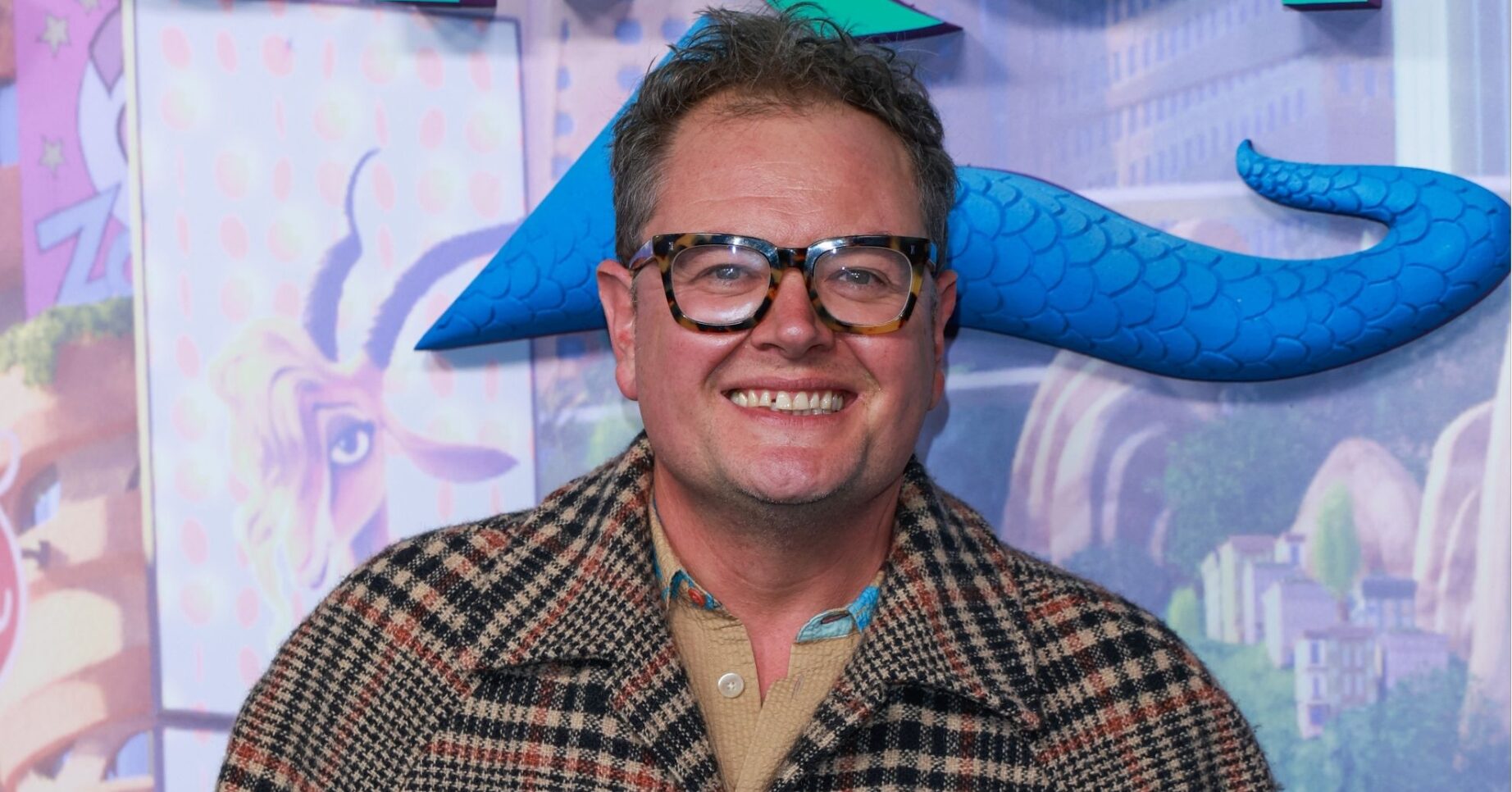 ED pic: Alan Carr at an event smiling