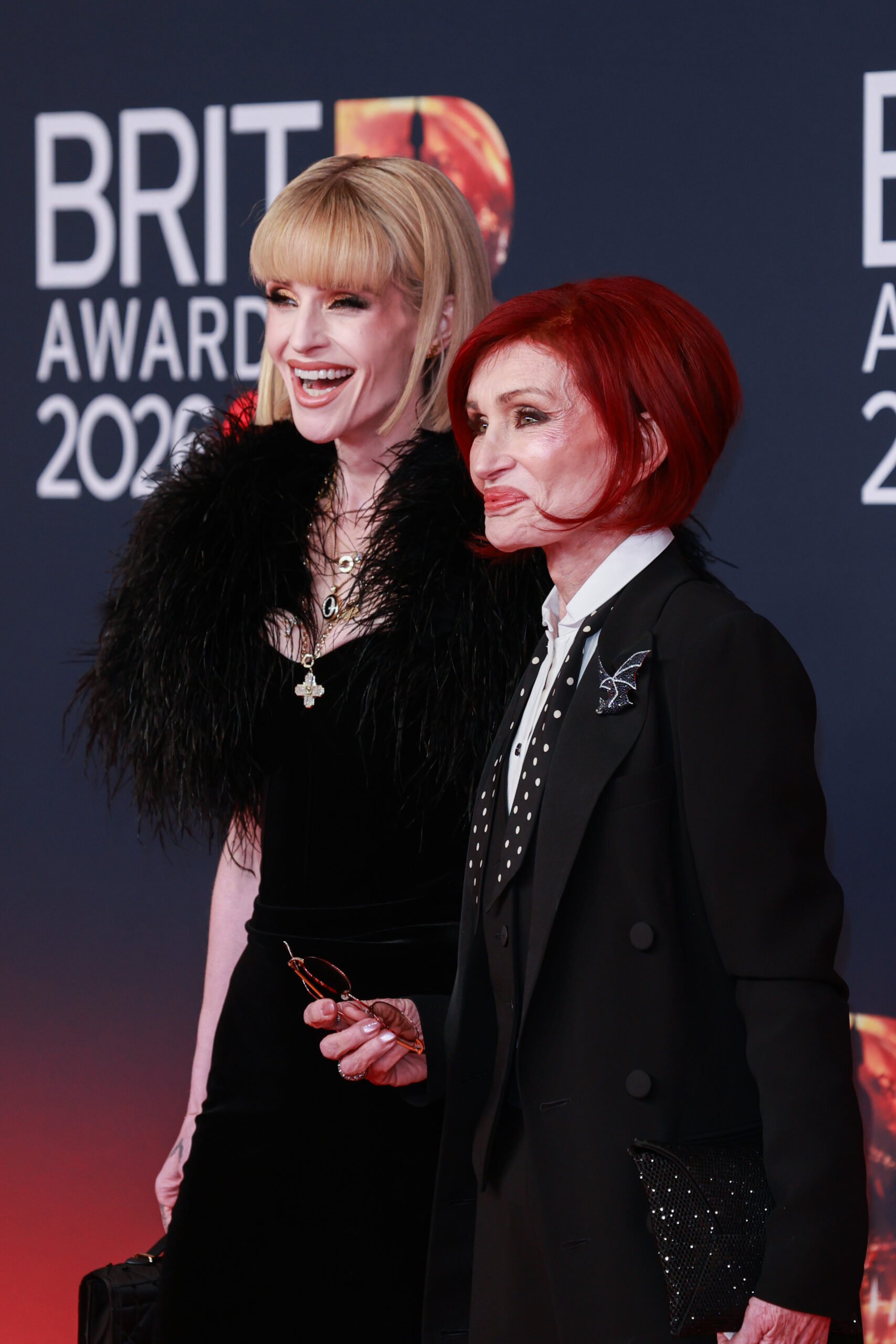 Kelly Osbourne and Sharon Osbourne on the BRITs red carpet