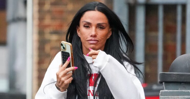 Katie Price walking in front