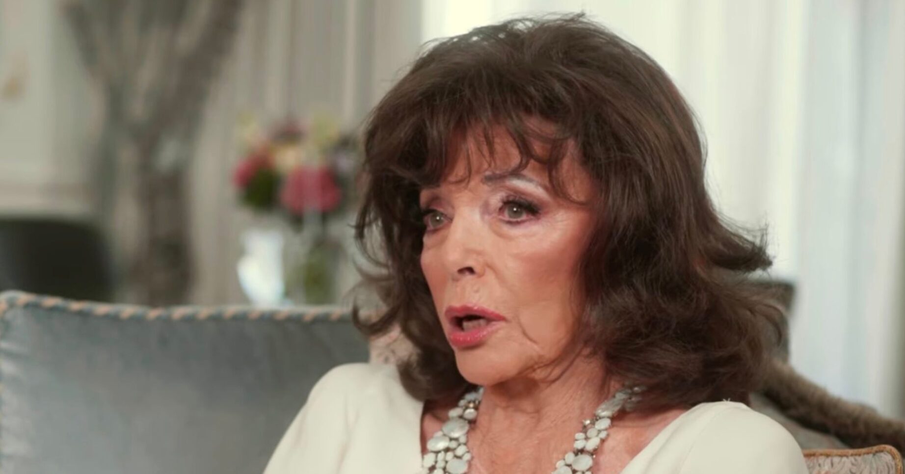Dame Joan Collins talking