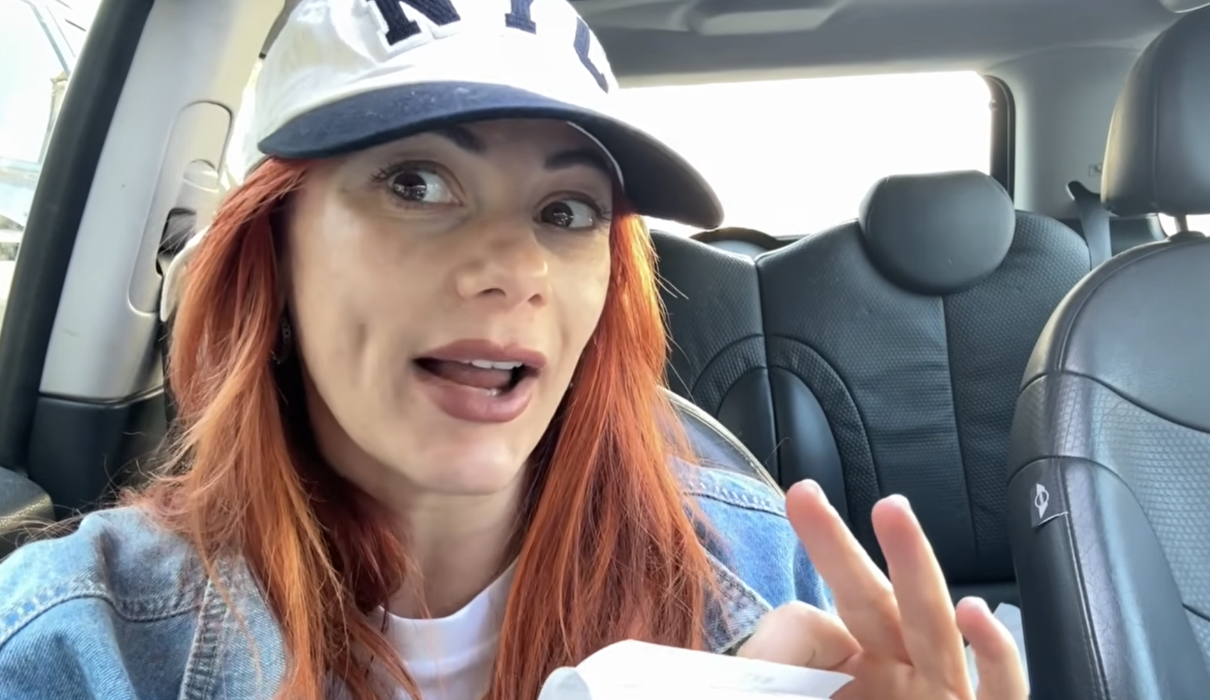 Dianne Buswell wearing a hat in her car talking to camera 