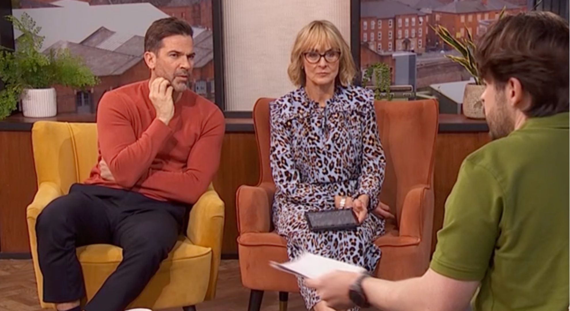 Gethin Jones in orange jumper and Louise Minchin in patterned dress