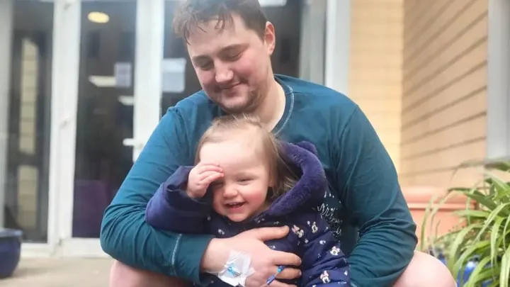 Finnian Garbutt and his daughter 