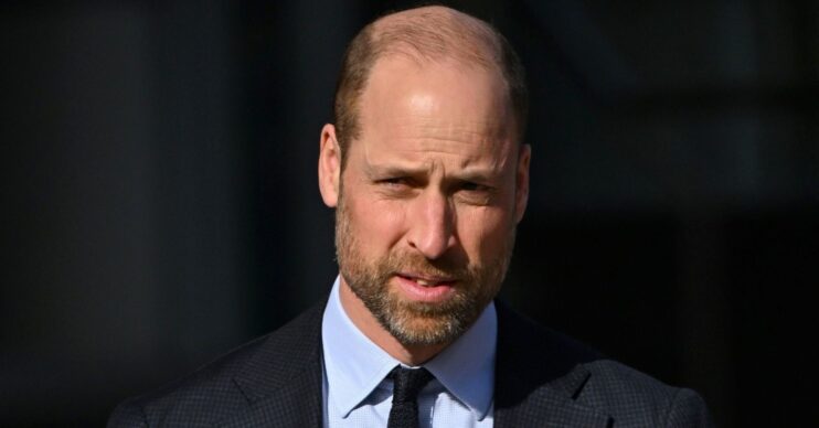 Prince William frowning