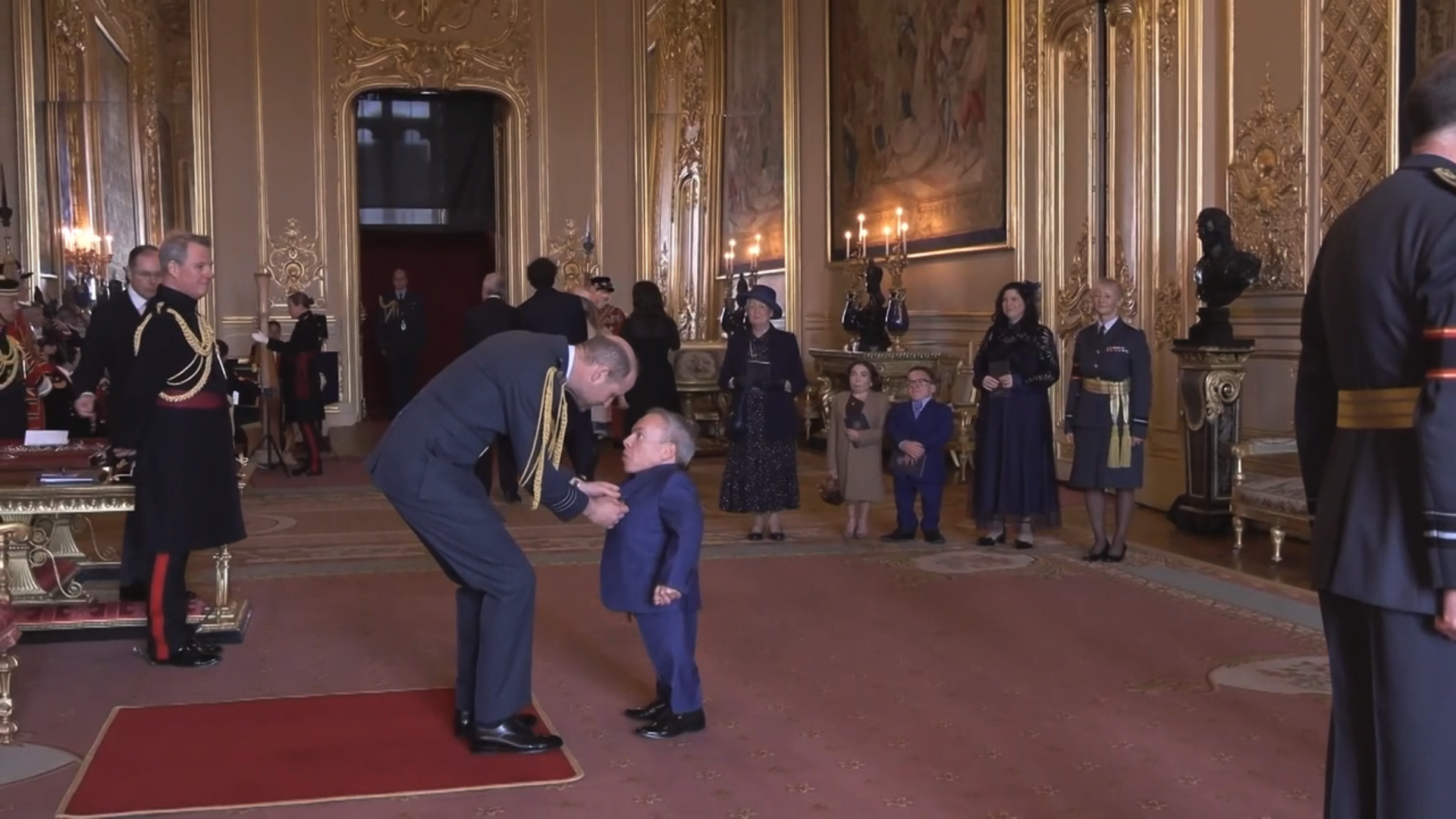 Warwick Davis at Windsor Castle with girlfriend
