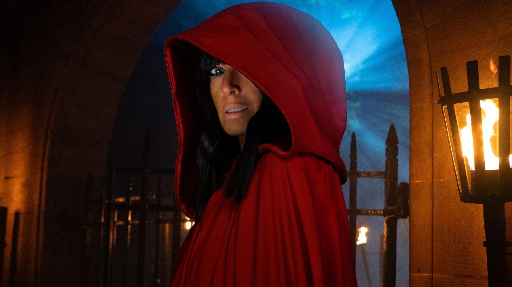 Claudia in red cloak