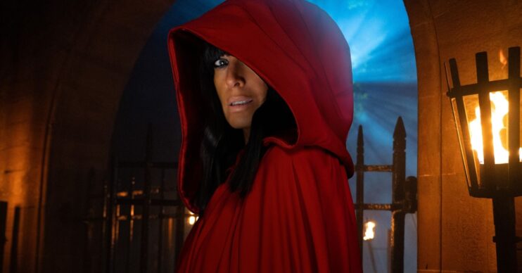Claudia in red cloak
