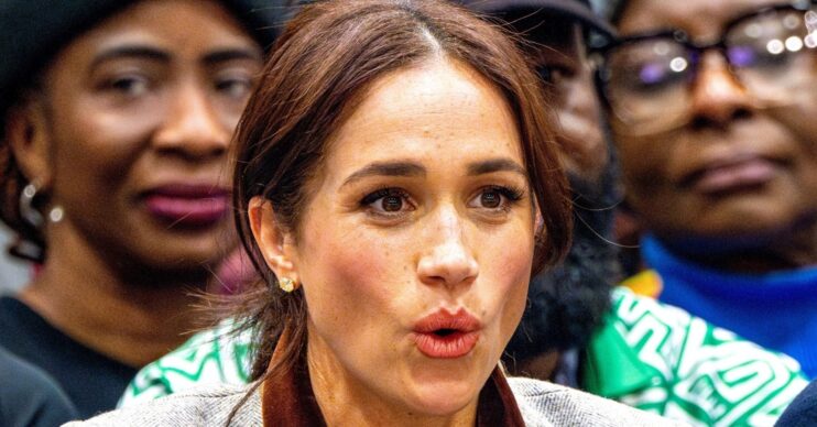 Meghan Markle with a shocked expression