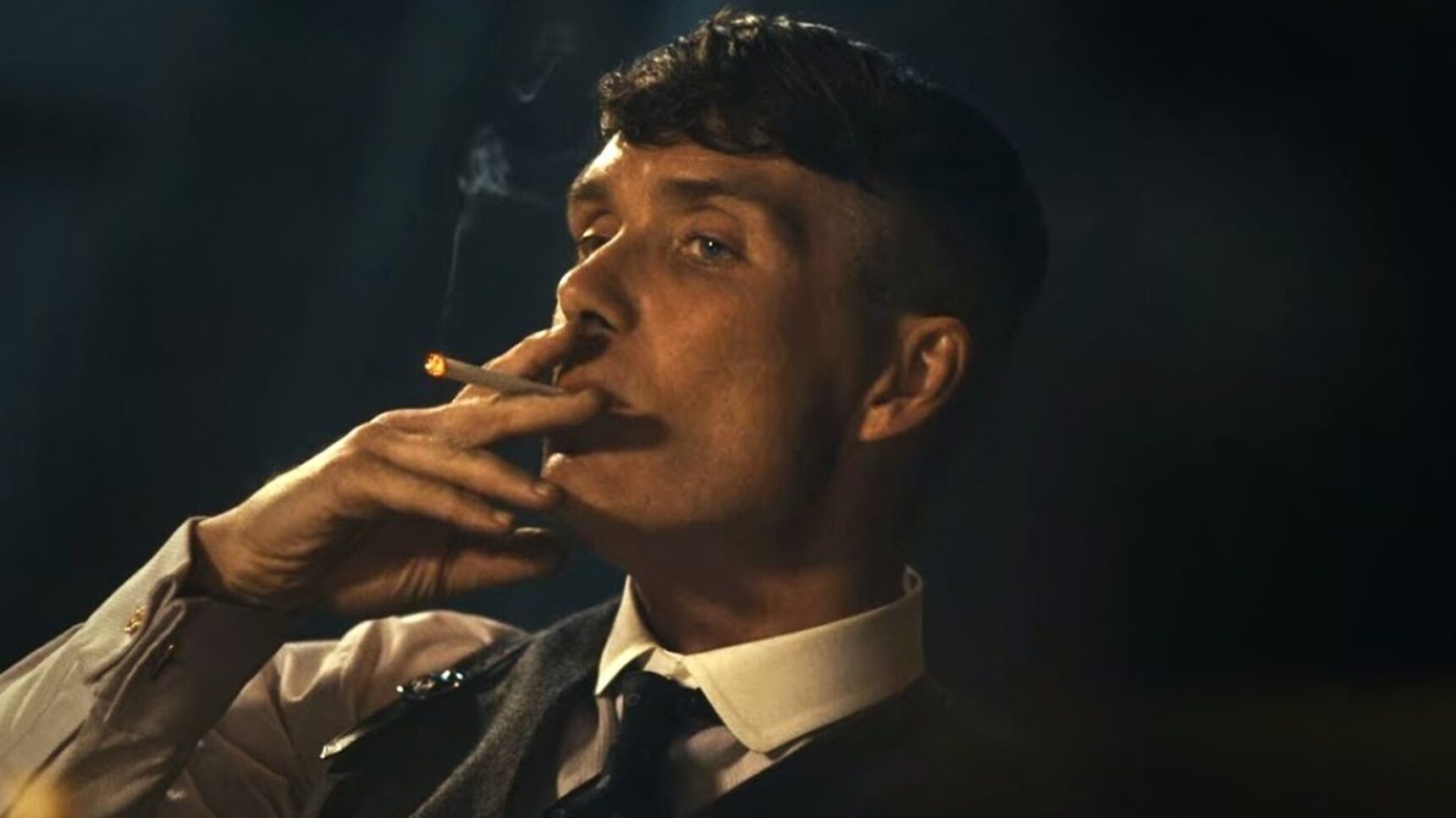 Cillian Murphy smoking a cigarette in Peaky Blinders