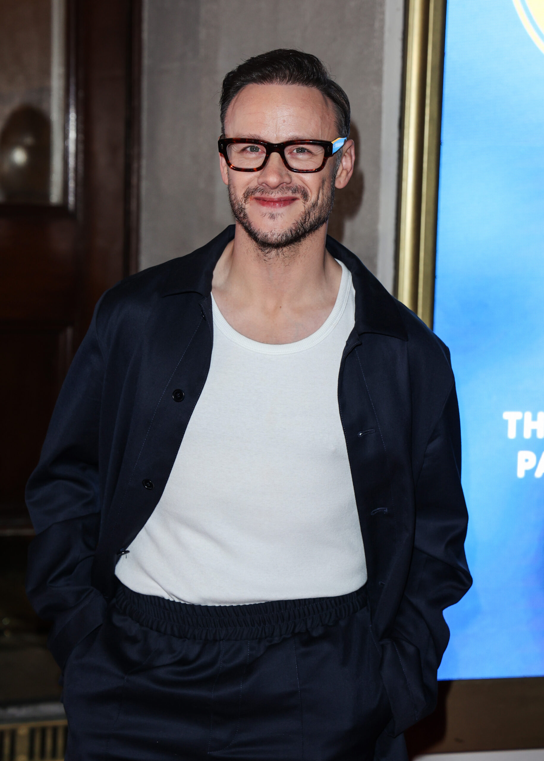 Kevin Clifton wearing glasses