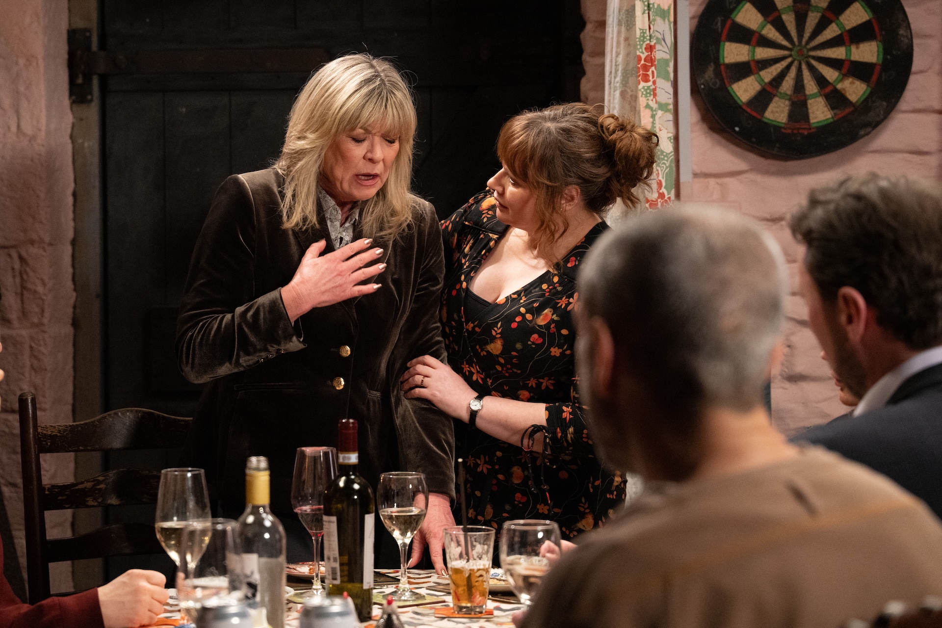 Kim clutches her chest in pain as Lydia looks on concerned in Emmerdale spoilers