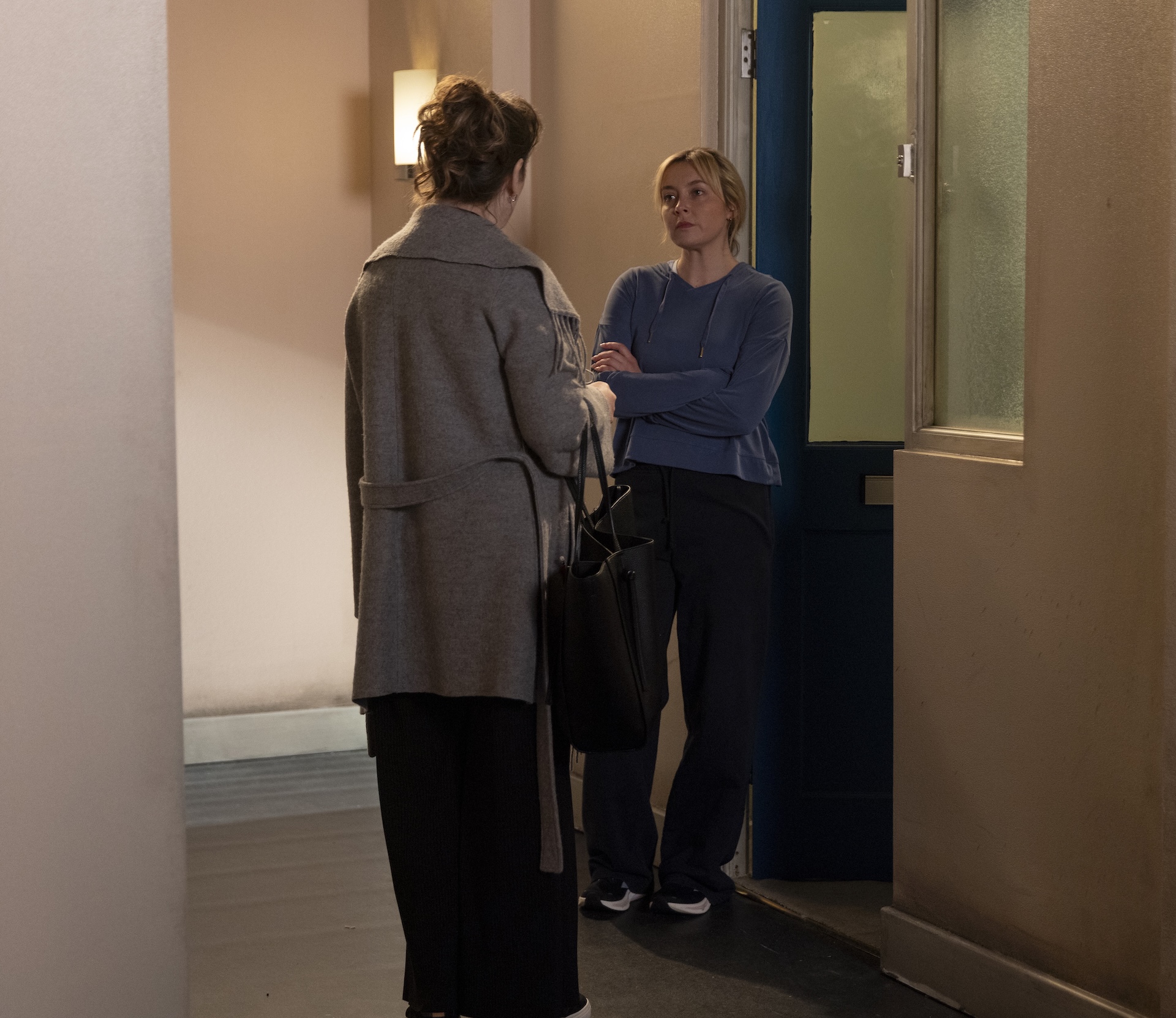 Maggie and Megan staring at each other