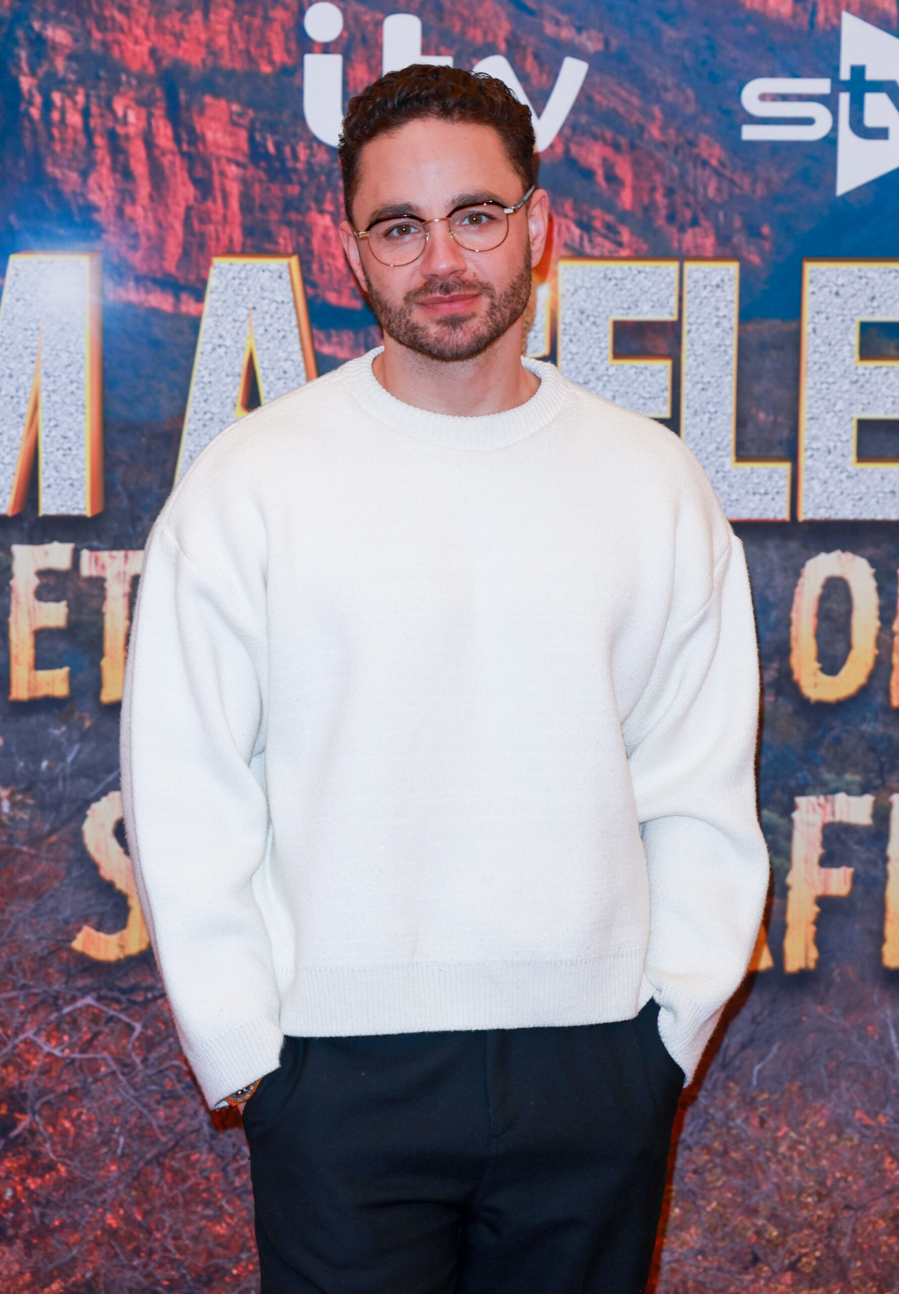 Adam Thomas on the red carpet for I'm A Celebrity All Stars
