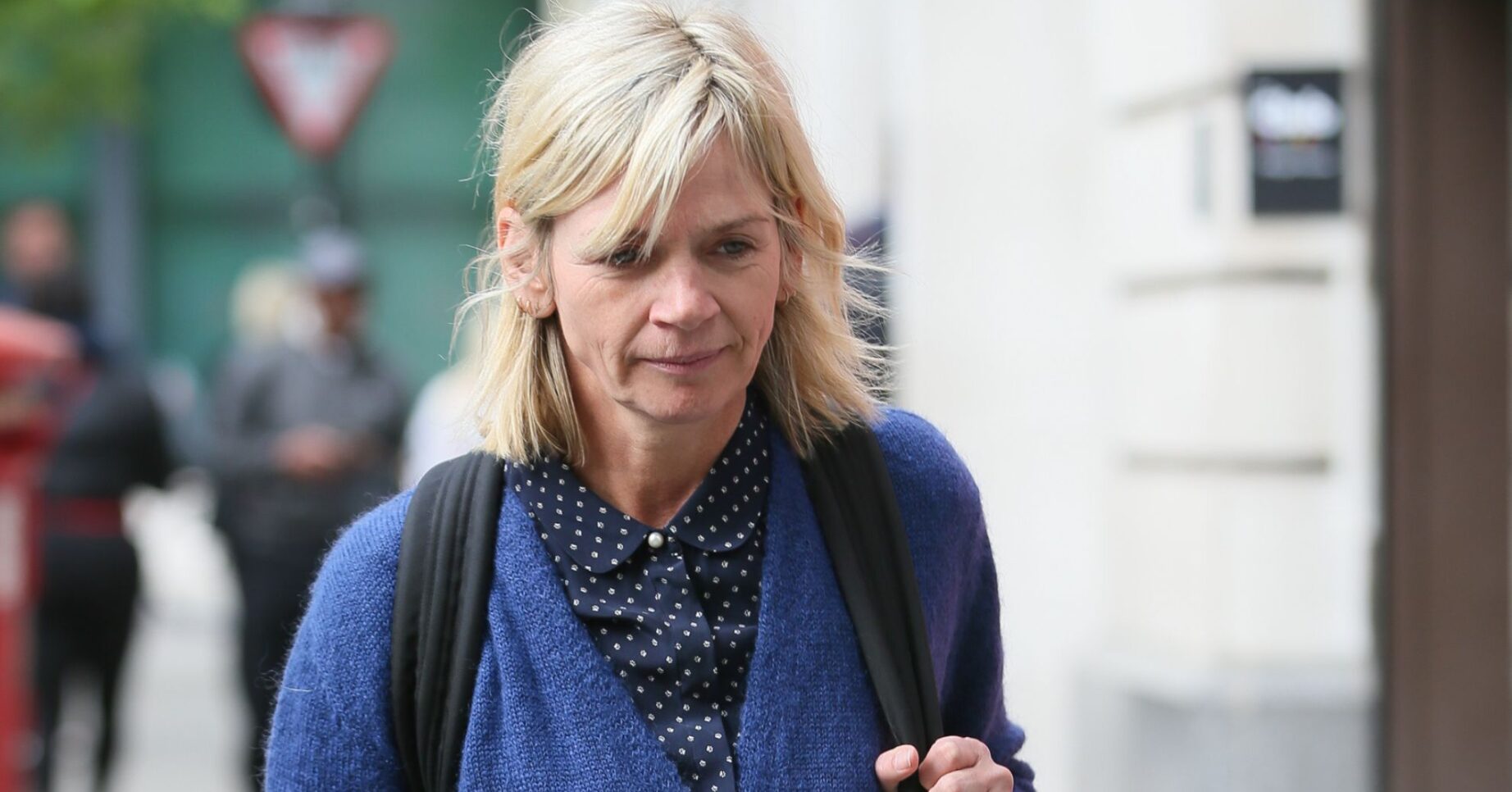 Zoe Ball looking down