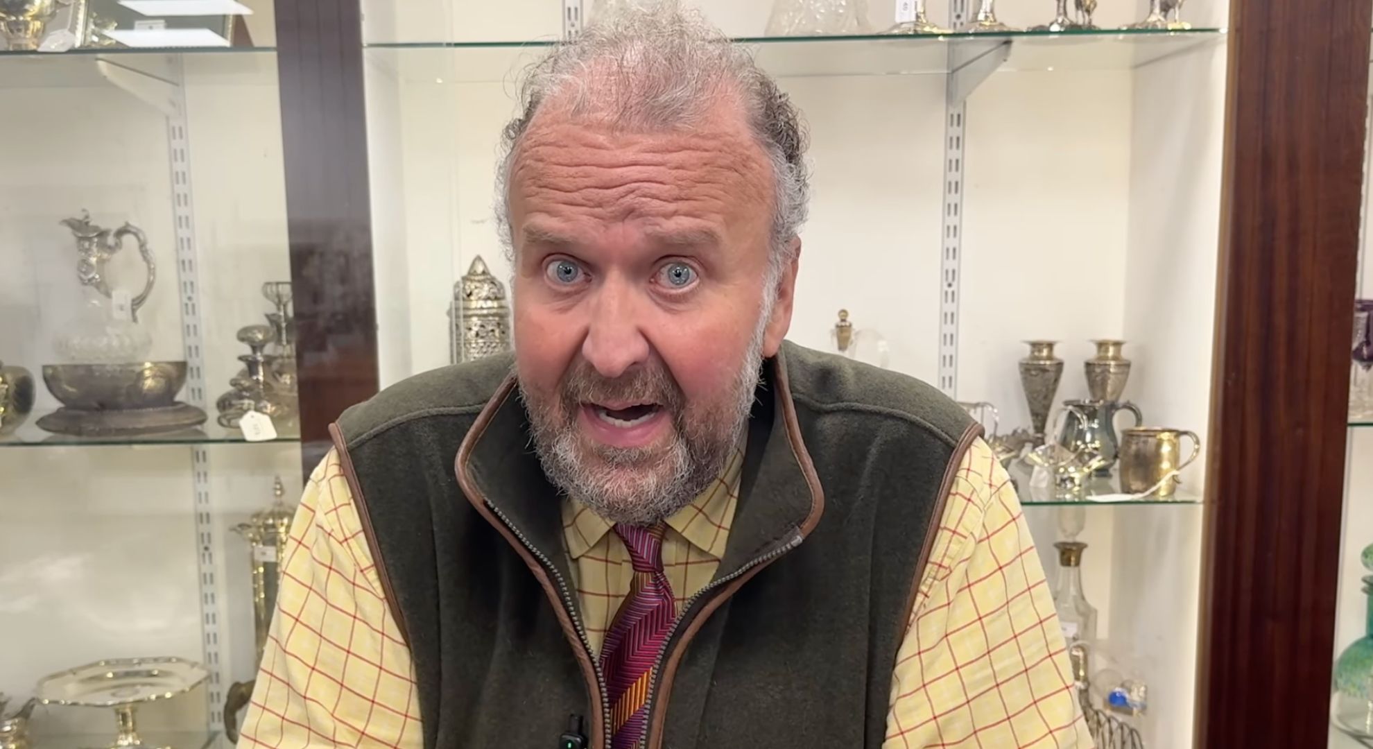 James Lewis speaking to camera 