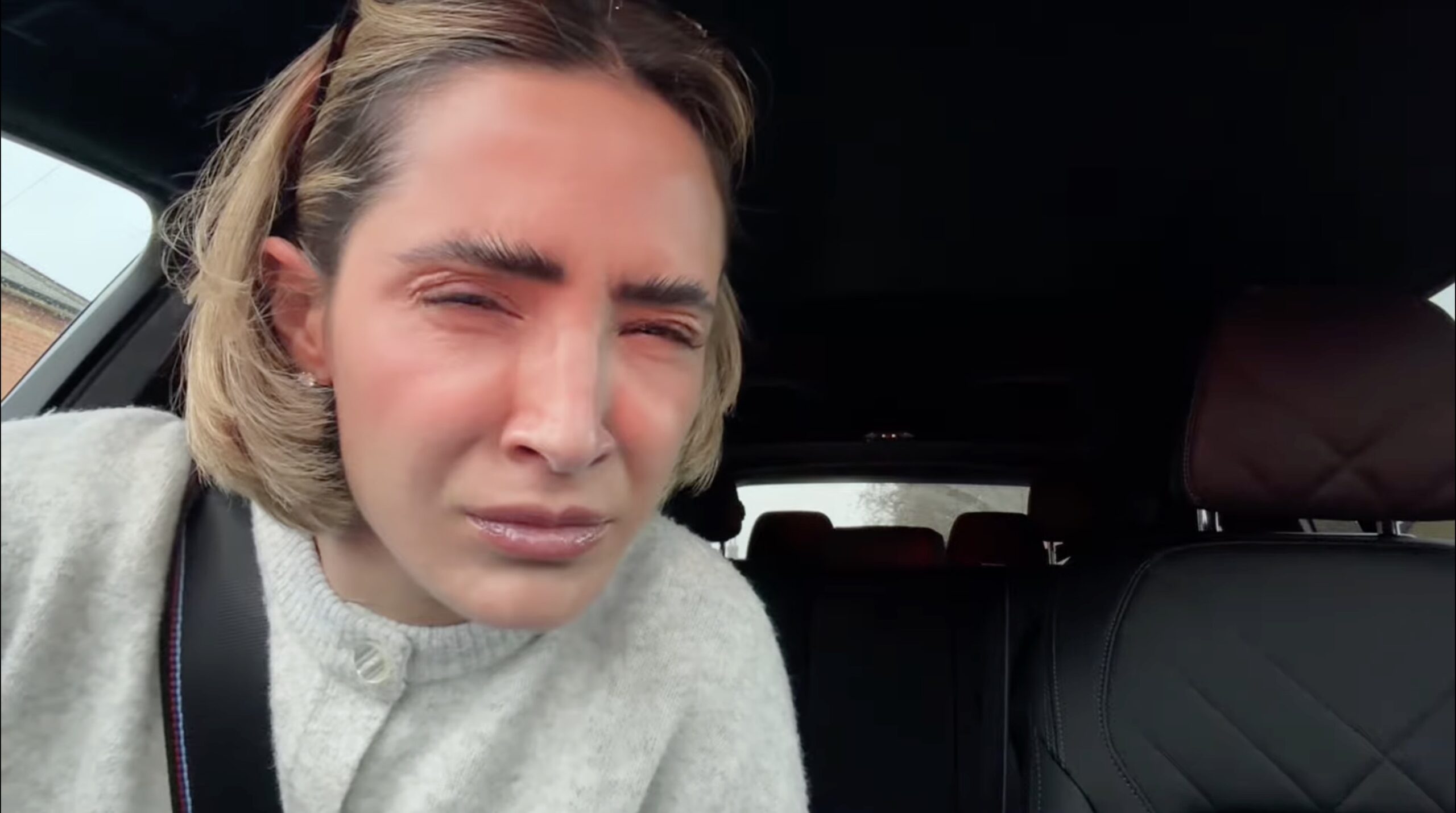 Frankie Bridge frowning