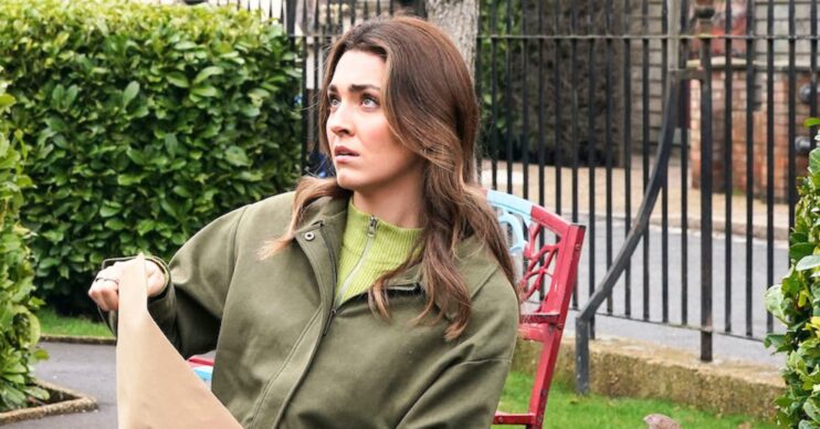 Penny in EastEnders looking worried