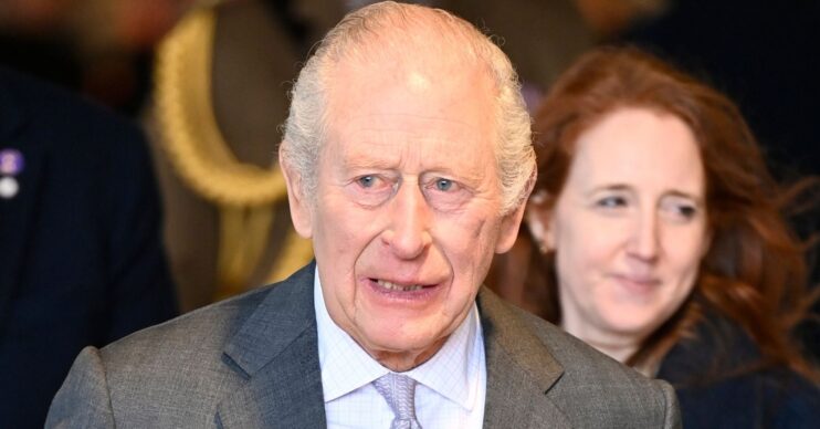 King Charles grimacing