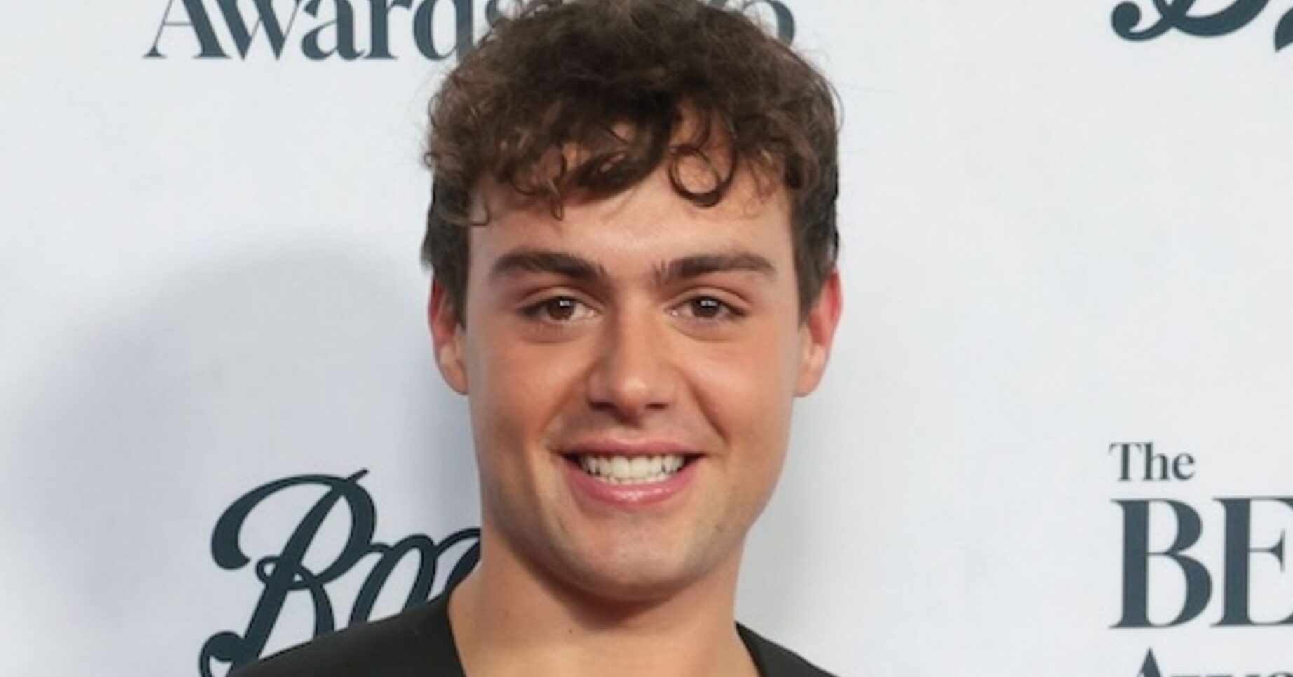 Bradley Riches smiles (Credit: James Shaw/Shutterstock)