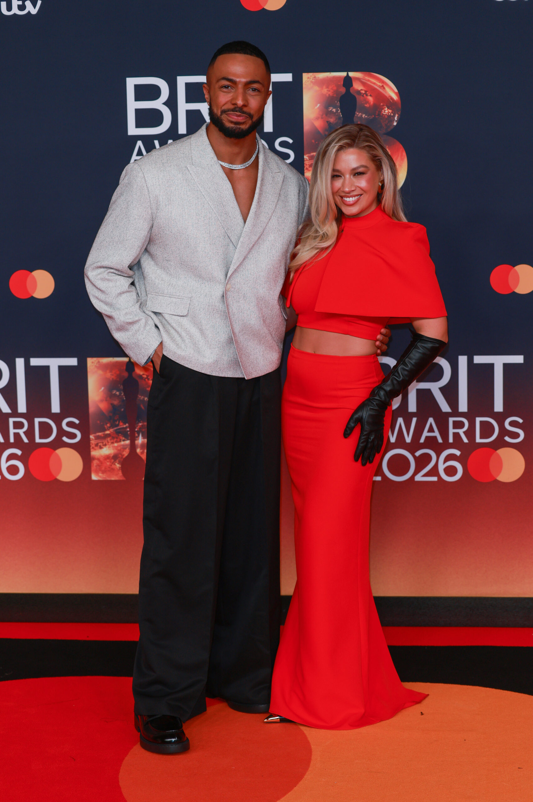 Molly Rainford and Tyler West smiling