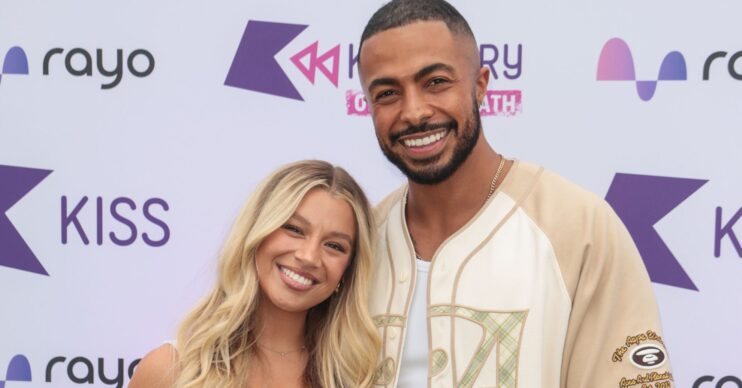 Molly Rainford and Tyler West smiling