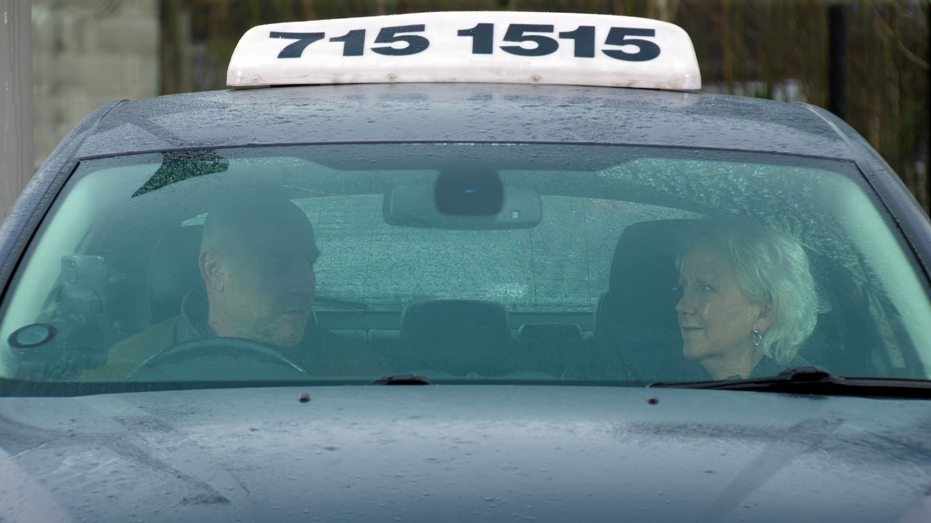 Tim and Tricia in cab together 