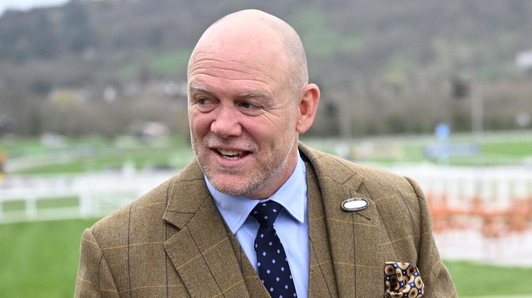 Mike Tindall in suit at the races