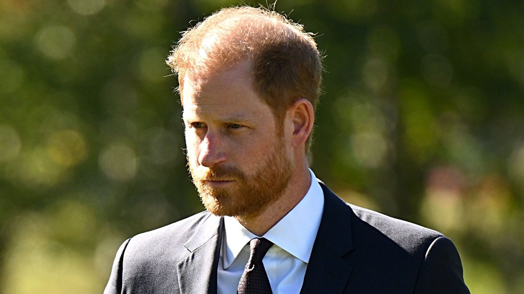 Prince Harry looking serious in Australia