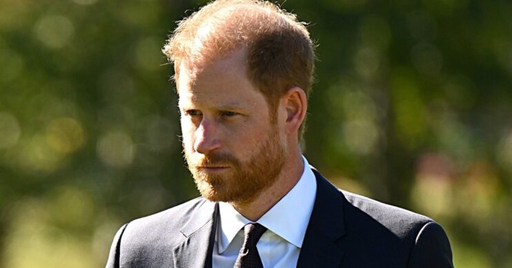 Prince Harry looking serious in Australia