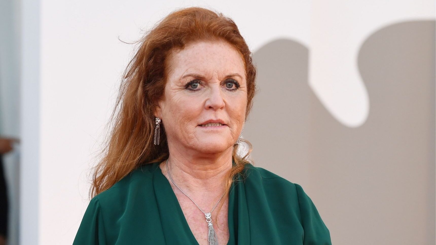Sarah Ferguson looking worried in green dress