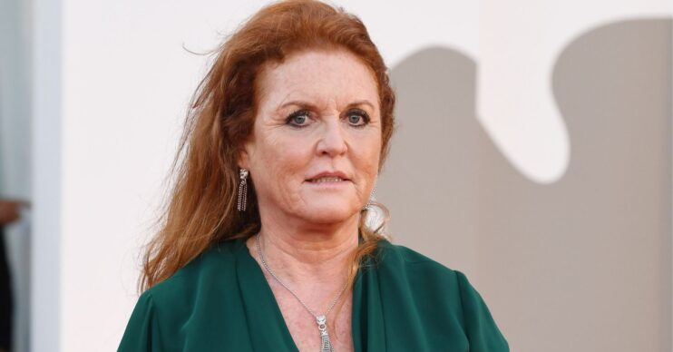 Sarah Ferguson looking worried in green dress