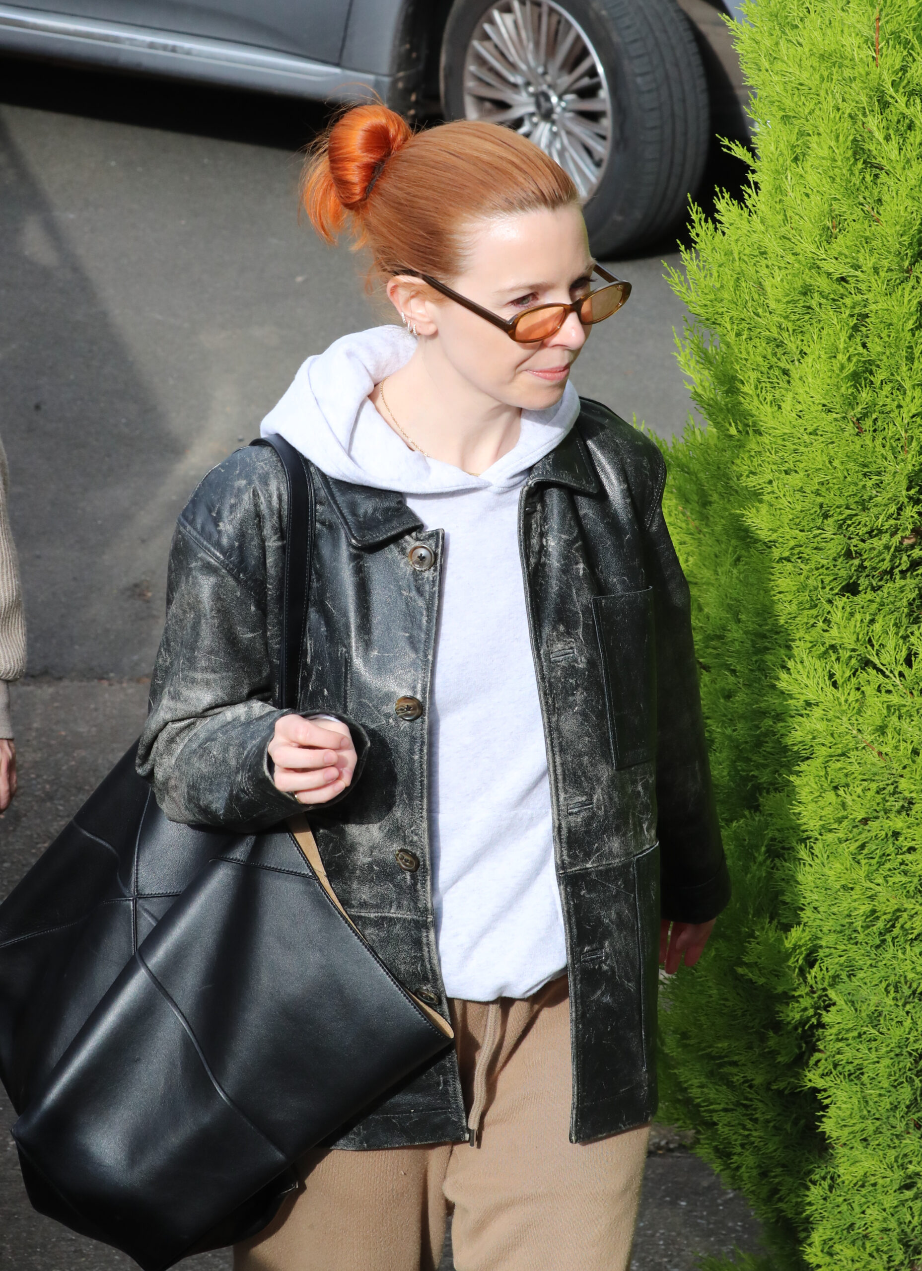 Stacey Dooley wearing sunglasses