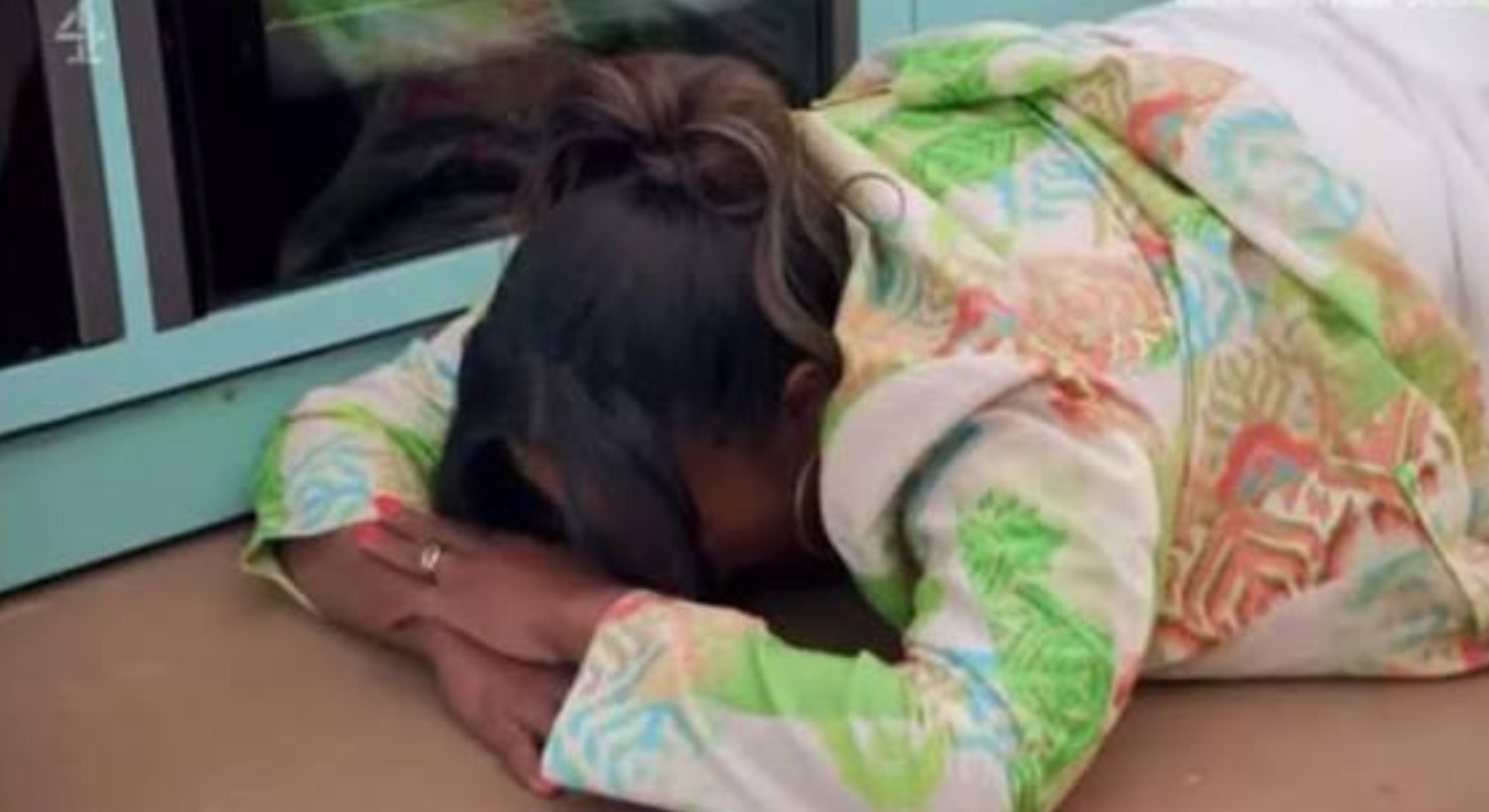 Alison Hammond on the floor on Bake Off
