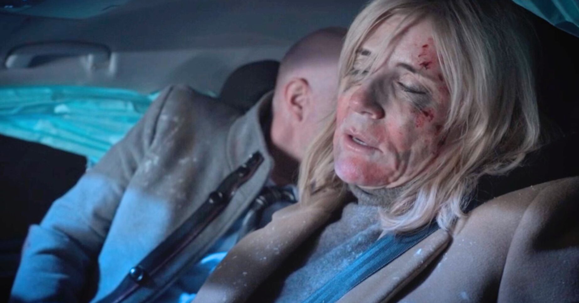 Max and Cindy trapped in the car wreckage