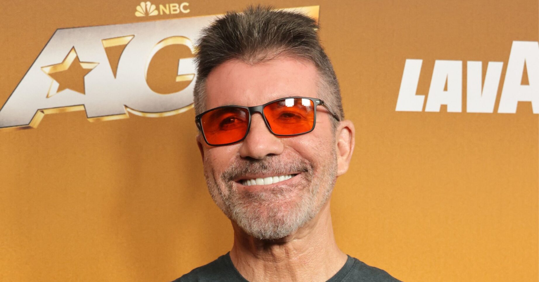 Simon Cowell smiling