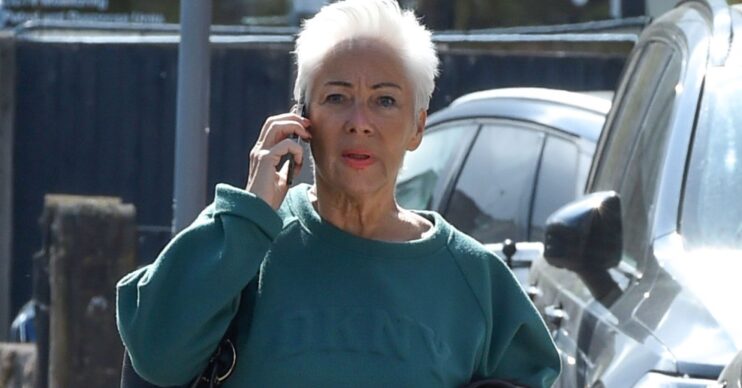 Denise Welch on phone in street