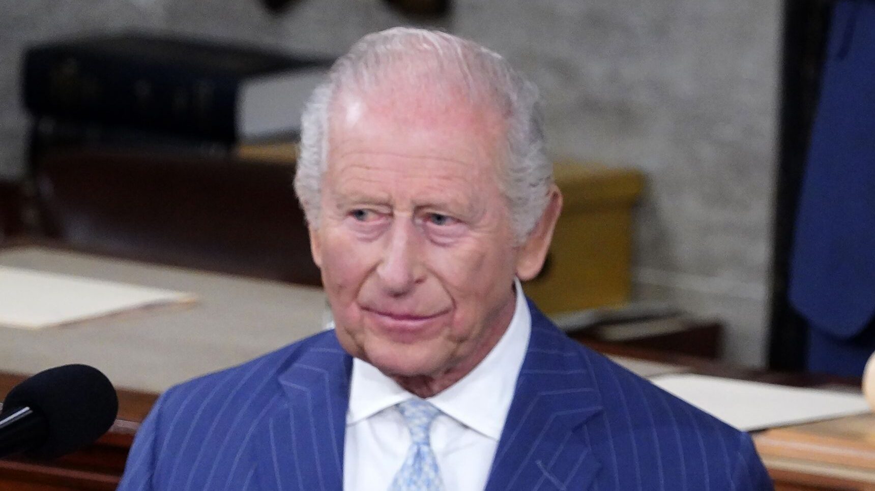 King Charles in blue suit