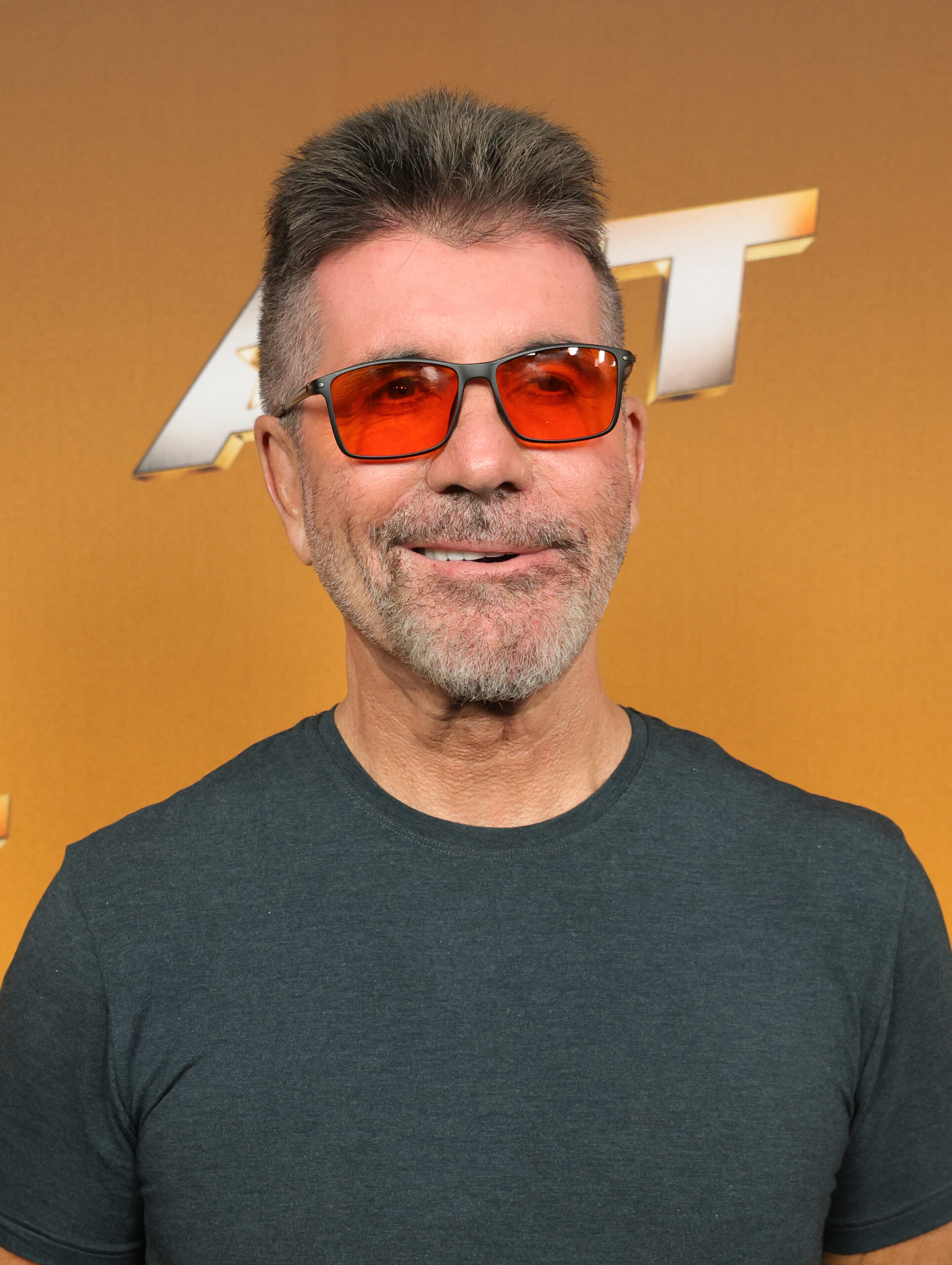 Simon Cowell smiling