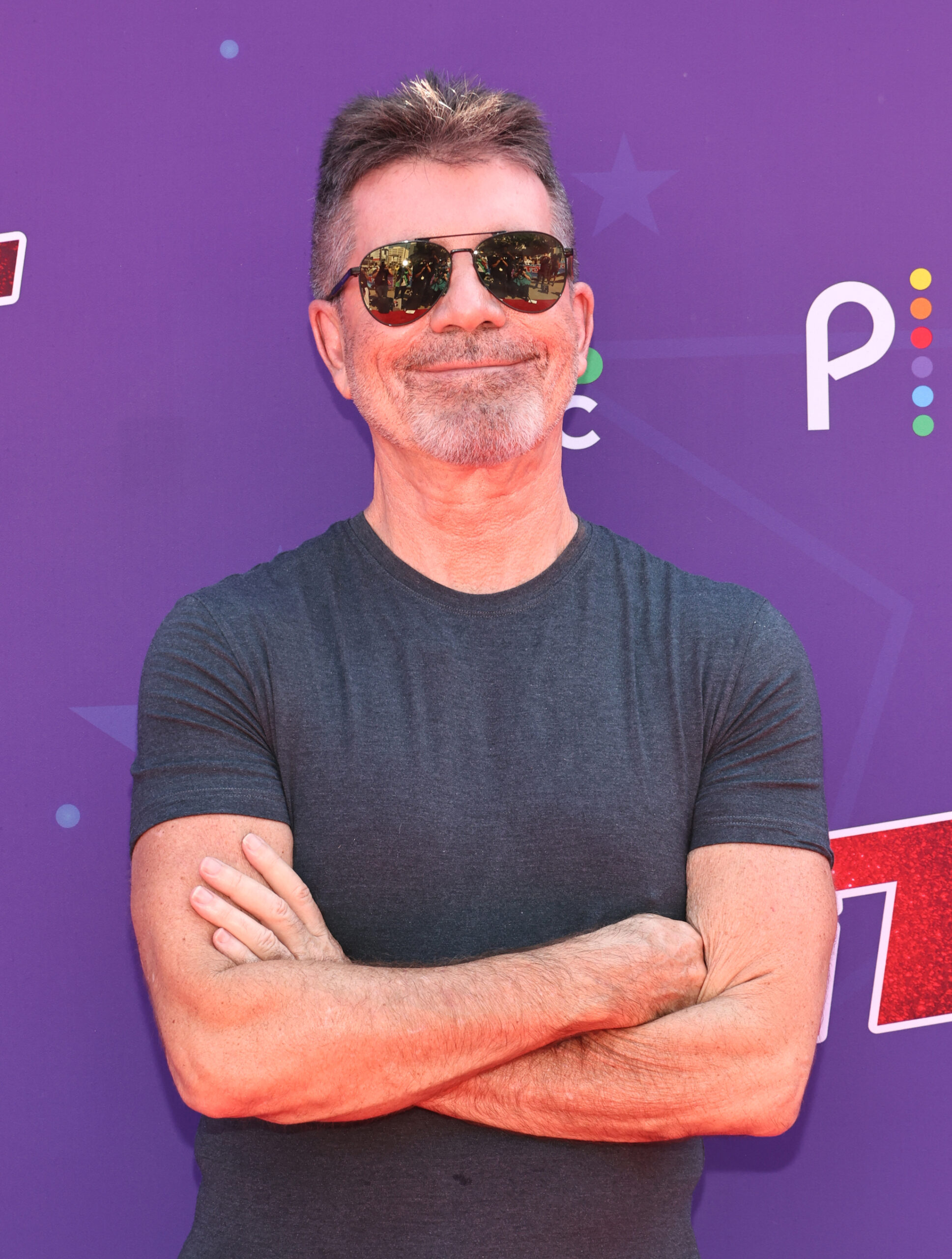 Simon Cowell smiling