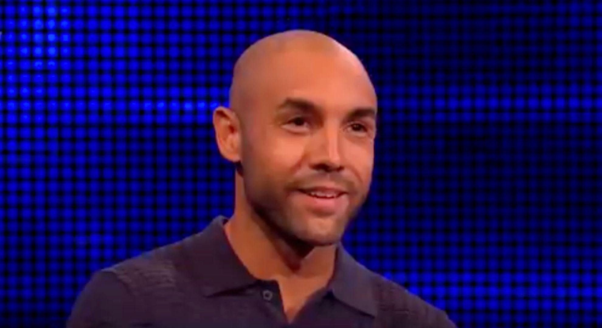 Alex Beresford smiles as he attempts to take on The Chaser on the ITV gameshow The Chase