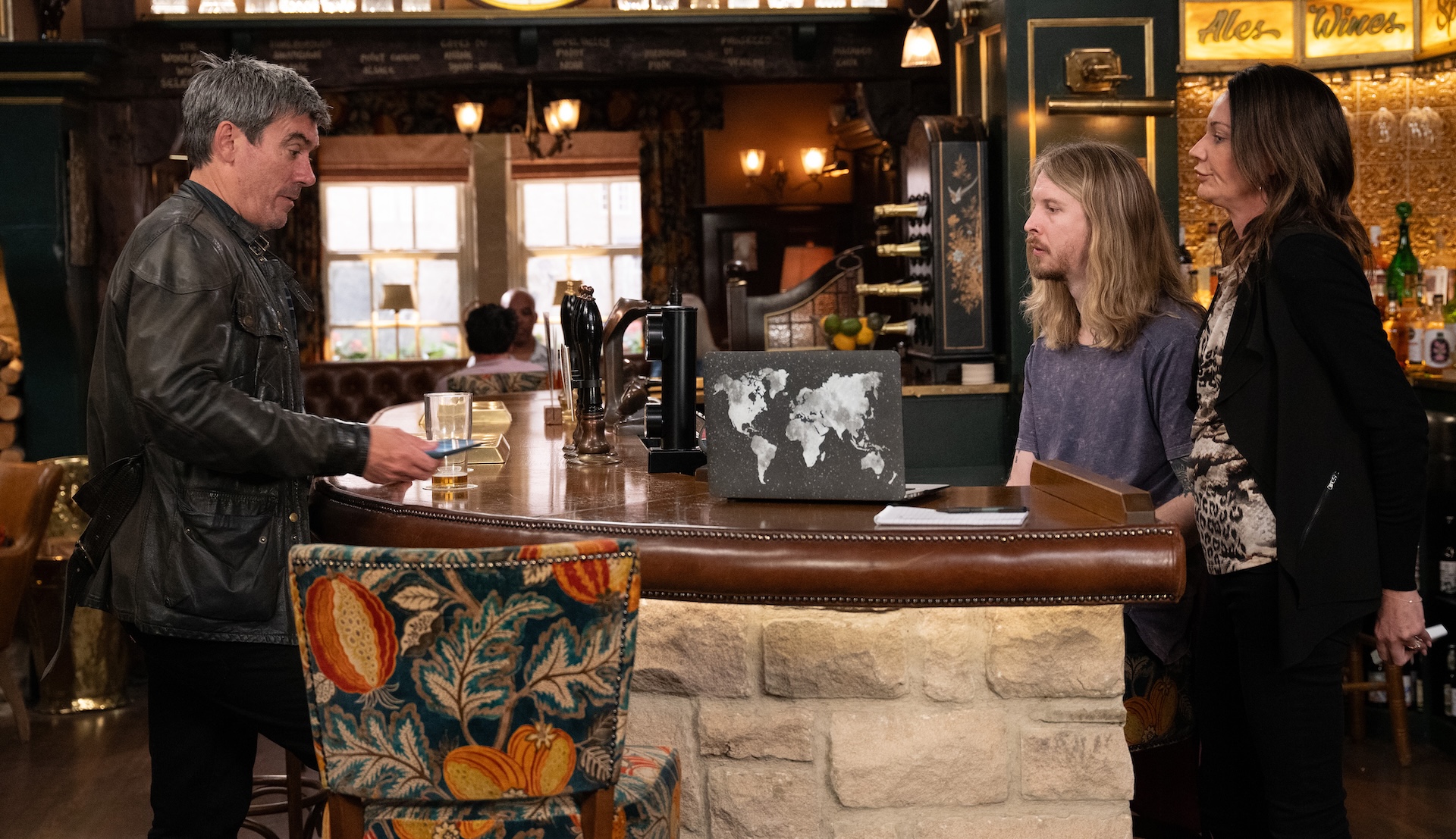 Cain, Ryan and Chas talking in the Woolpack