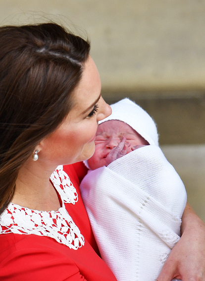 Kate cradles her newborn son