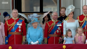 Royal Family stand for national anthem