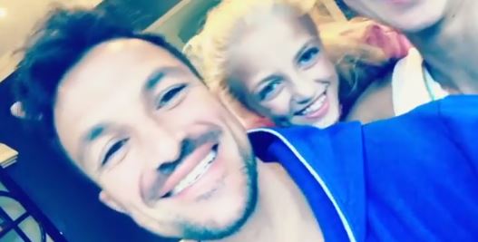 Peter Andre records message as Princess and Emily play around in background
