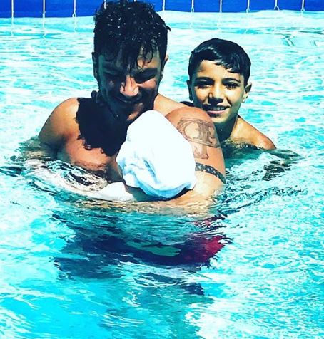 Peter Andre with sons Junior and Theo in a Cyprus swimming pool