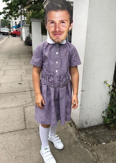 Harper Beckham wears mask of dad David's face on way to school